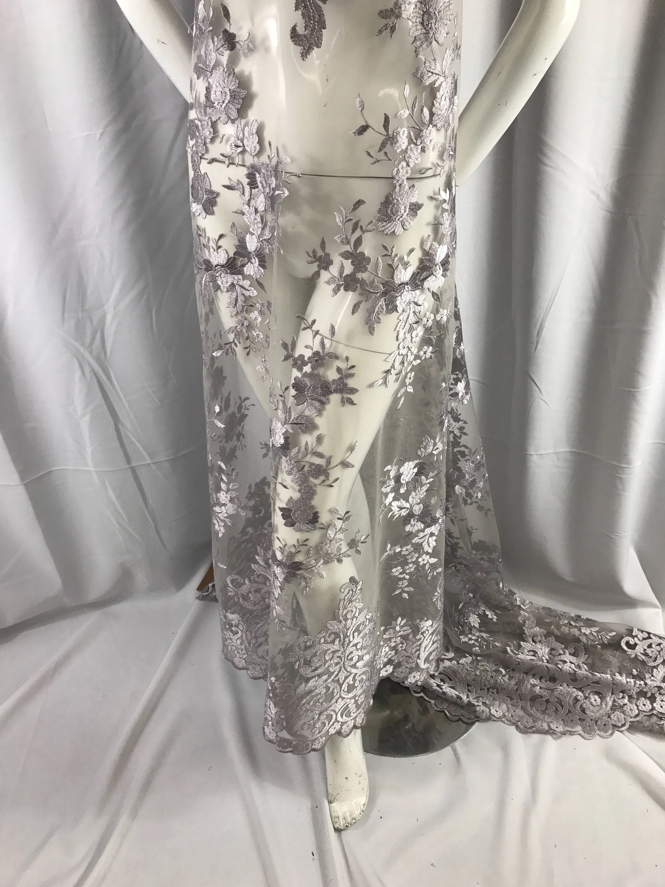 Silver/gray flowers embroider on a 2 way stretch mesh lace. Wedding/Bridal/Prom/Nightgown fabric-apparel-dresses-fashion-Sold by the yard.